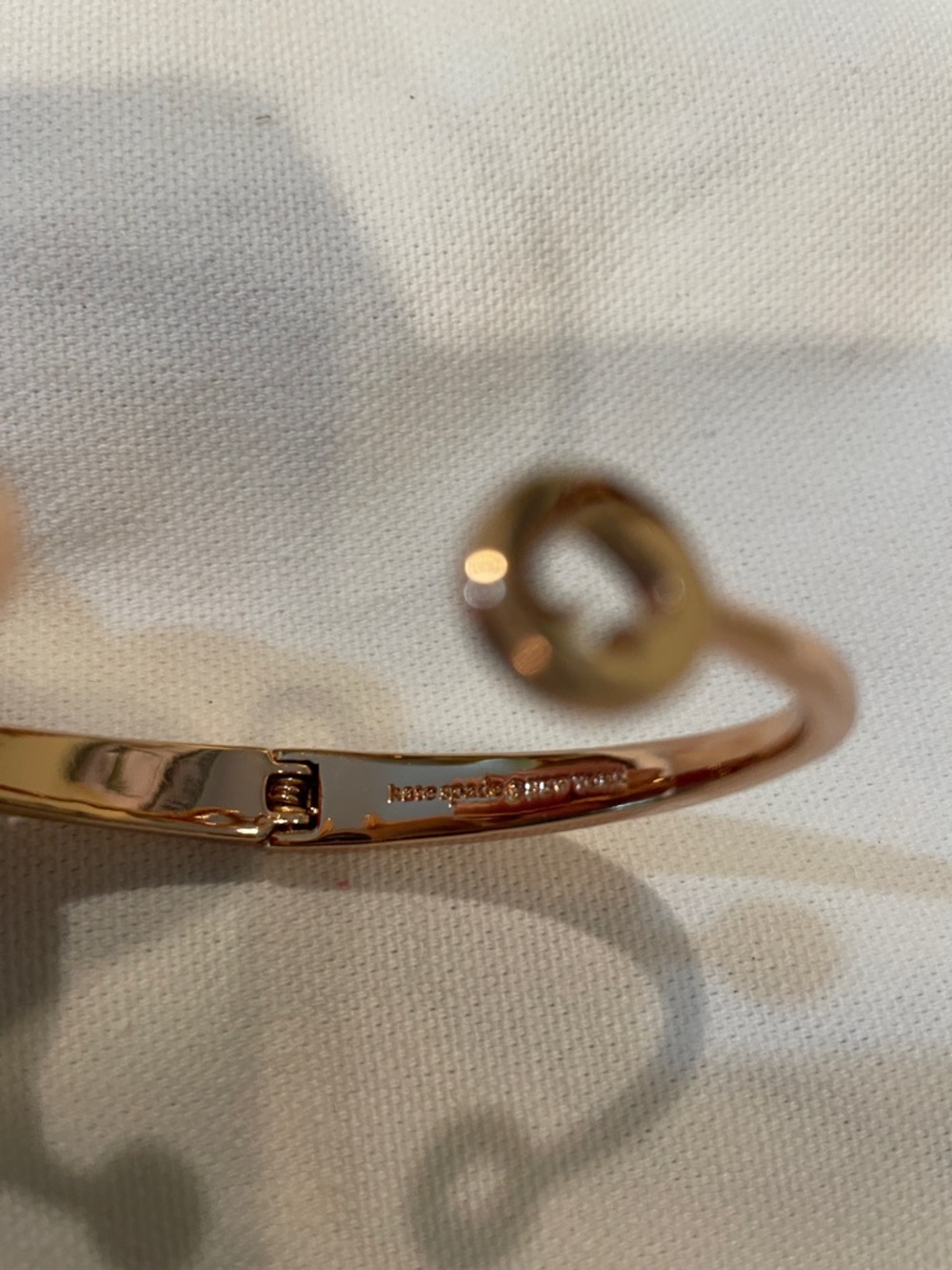 kate spade New York gold-tone  open bangle with crystal and cutout charm - Picture 7 of 11